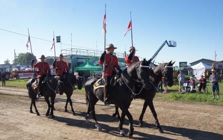 Four members of the RCMP carried flags in the parade.